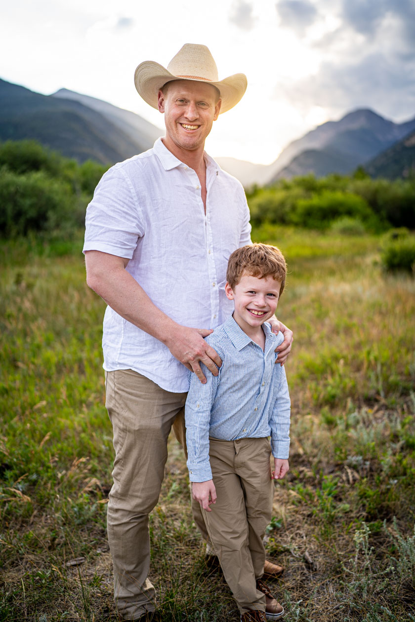 father and son photo in rocky mountain national park, captured by estes park family photographer joe pyle